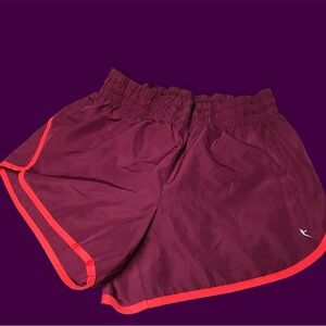 Danskin Now running shorts. Size M (8-10). Maroon with red piping